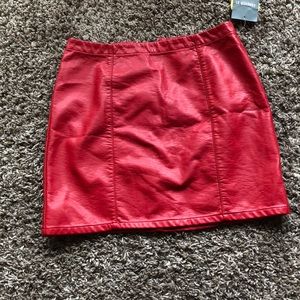 Faux leather red mini skirt .
